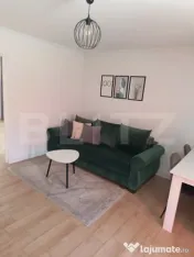 DE ÎNCHIRIAT: Casă cochetă cu 2 camere, terasă și loc d 