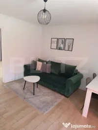 DE ÎNCHIRIAT: Casă cochetă cu 2 camere, terasă și loc d 