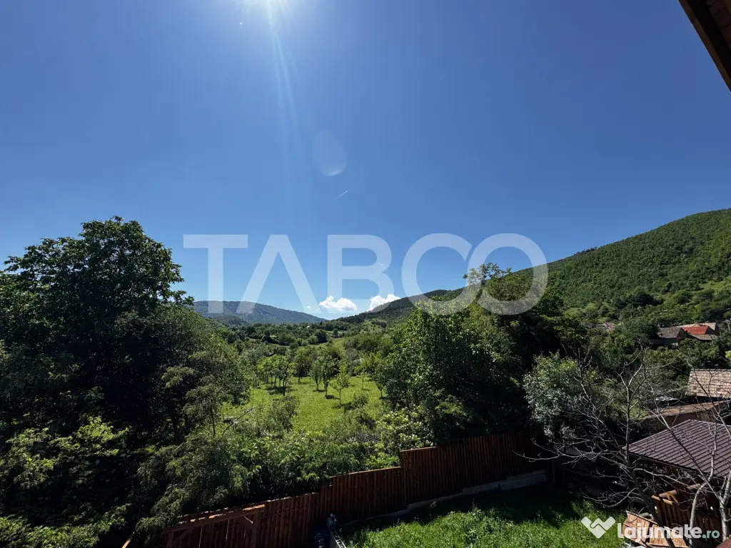Casa de vis la munte 7 camere 5 bai ciubar teren 558 mp Rasi - Rasinari (Sibiu)