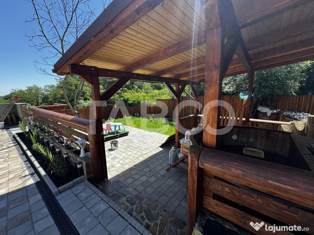 Casa de vis la munte 7 camere 5 bai ciubar teren 558 mp Rasi - Rasinari (Sibiu)