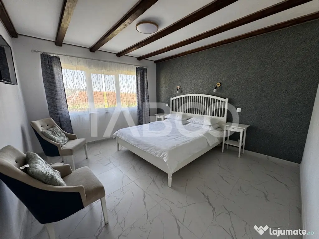 Casa de vis la munte 7 camere 5 bai ciubar teren 558 mp Rasi - Rasinari (Sibiu)