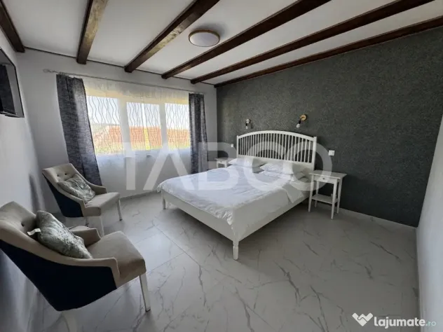 Casa de vis la munte 7 camere 5 bai ciubar teren 558 mp Rasi - Rasinari (Sibiu)