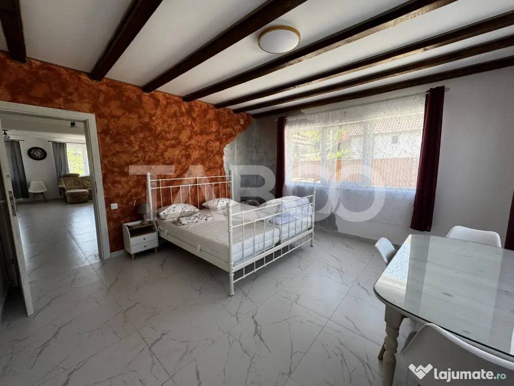 Casa de vis la munte 7 camere 5 bai ciubar teren 558 mp Rasi - Rasinari (Sibiu)