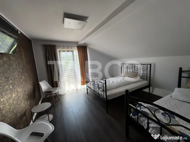 Casa de vis la munte 7 camere 5 bai ciubar teren 558 mp Rasi - Rasinari (Sibiu)