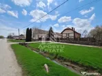 Casă spațioasă cu 2 locuințe și teren generos de 5.755 mp în Șandra