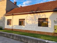Casa cu 3 camere si curte comuna -zona Parneava