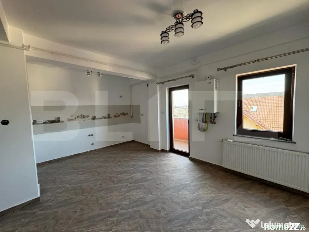 Apartament 3 camere, 100mp, situat pe 2 niveluri, zona Radau