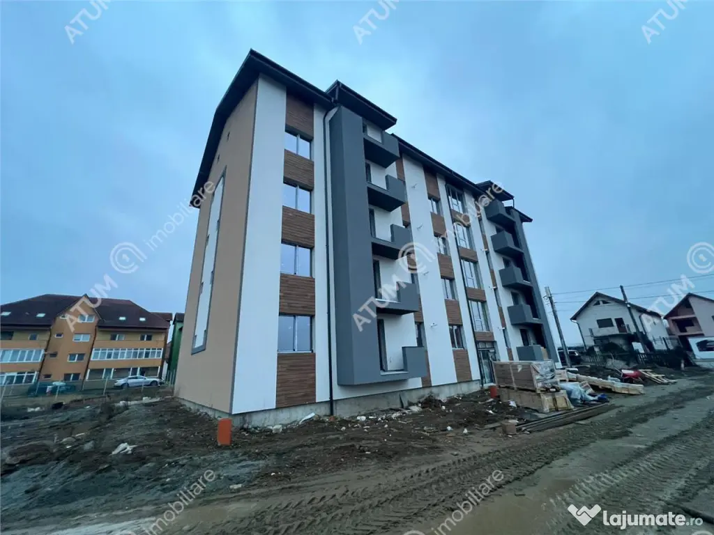 Garsoniera intabulata decomandata si loc parcare in Talmaciu