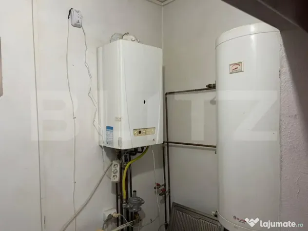 Casa de vanzare in suprafat utila de 100 mp si 1400 mp teren