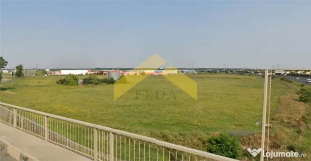 De teren intravilan 4,9 ha la coborare de pe autostrada spr