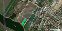 Teren intravilan 2.091 mp cu deschidere la lac – Afumați