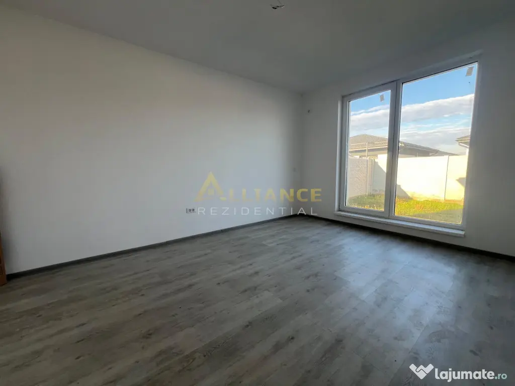 Casa de cu 3 camere,2 bai,teren 376mp