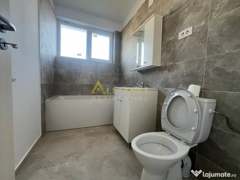 Casa de cu 3 camere,2 bai,teren 376mp