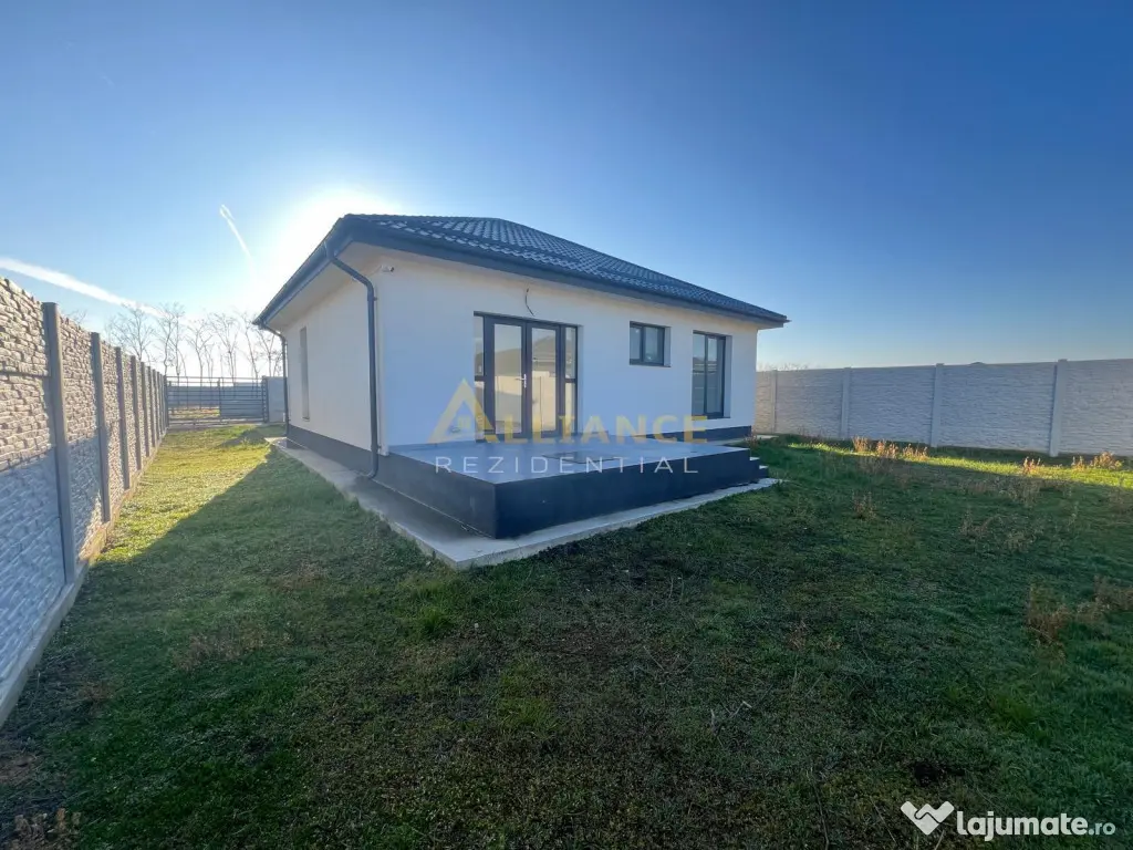 Casa de cu 3 camere,2 bai,teren 376mp