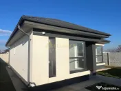 Casa de cu 3 camere,2 bai,teren 376mp 