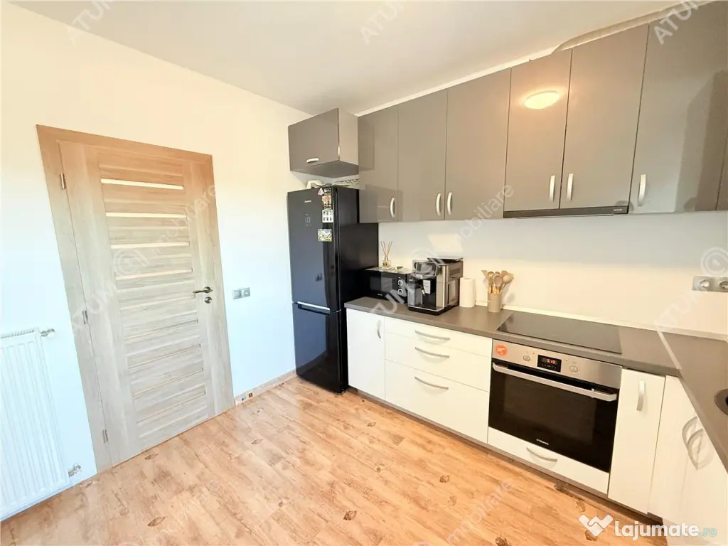 Apartament cu 2 camere decomandate la cheie si 120 mp gradin