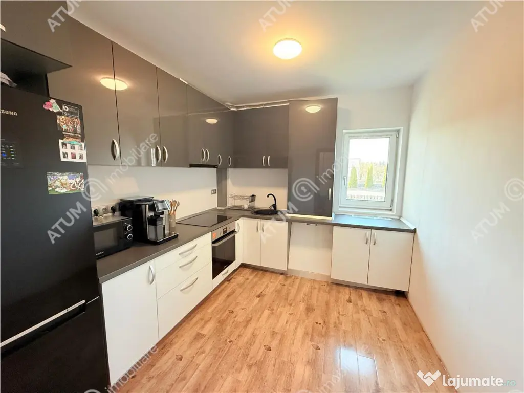 Apartament cu 2 camere decomandate la cheie si 120 mp gradin