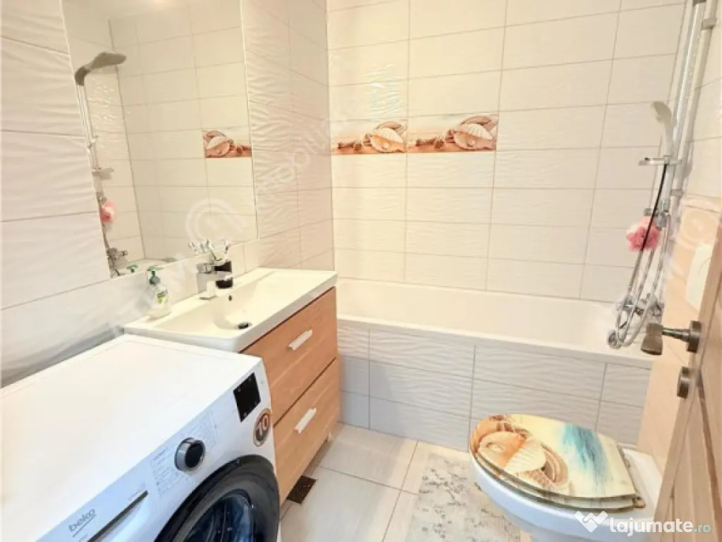 Apartament cu 2 camere decomandate la cheie si 120 mp gradin