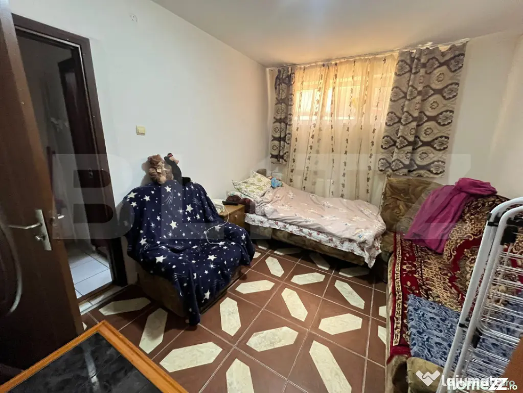 Apartament 2 camere parter – centrală proprie, bloc de c?