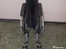 Scaun cu rotile pliabil carut dizabilitati,cu suporturi pt. asezat talpi picioare