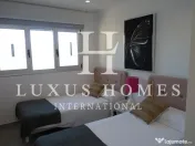 Parter casă duplex cu terasă și piscină comunitară într-o zonă aproape de plaje 