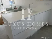 Parter casă duplex cu terasă și piscină comunitară într-o zonă aproape de plaje 