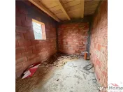 Casa la rosu din caramida de in comuna Carligele 