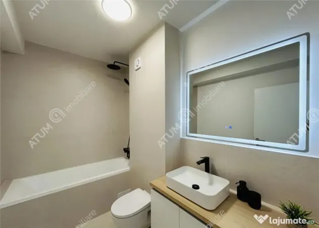 Apartament cu 3 camere 2 bai loc privat de parcare 72mp util