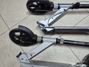 2 trotinete Oxelo, adulți/copii, roți 200 mm, suspensii, 350 lei împreună