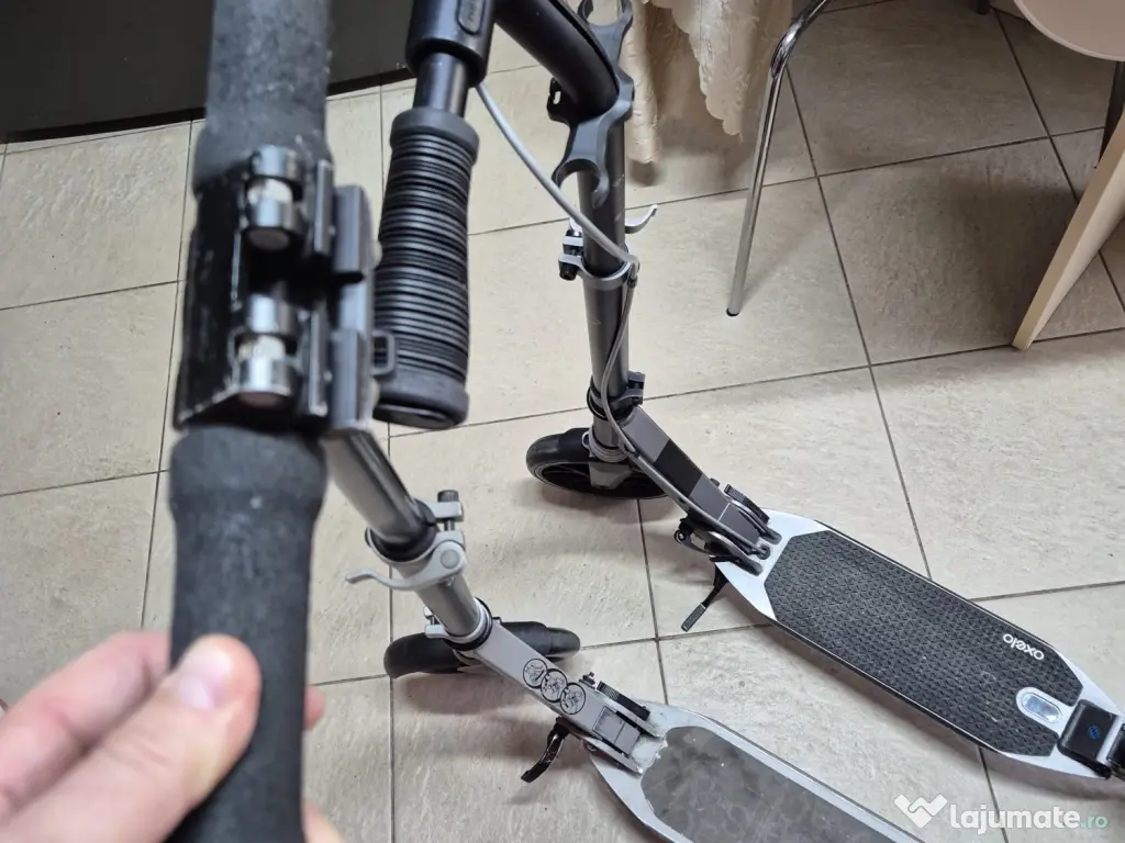 2 trotinete Oxelo, adulți/copii, roți 200 mm, suspensii, 350 lei împreună