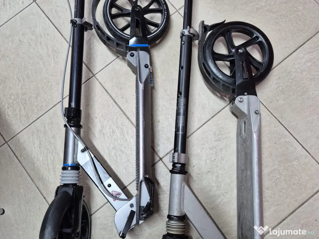 2 trotinete Oxelo, adulți/copii, roți 200 mm, suspensii, 350 lei împreună