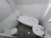 Casă cu 4 camere, 2 băi, beci spațios și 400 mp teren 