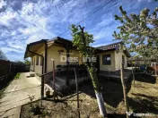 Casă 4 camere plan parter cu beci și anexe + 720 mp curte 