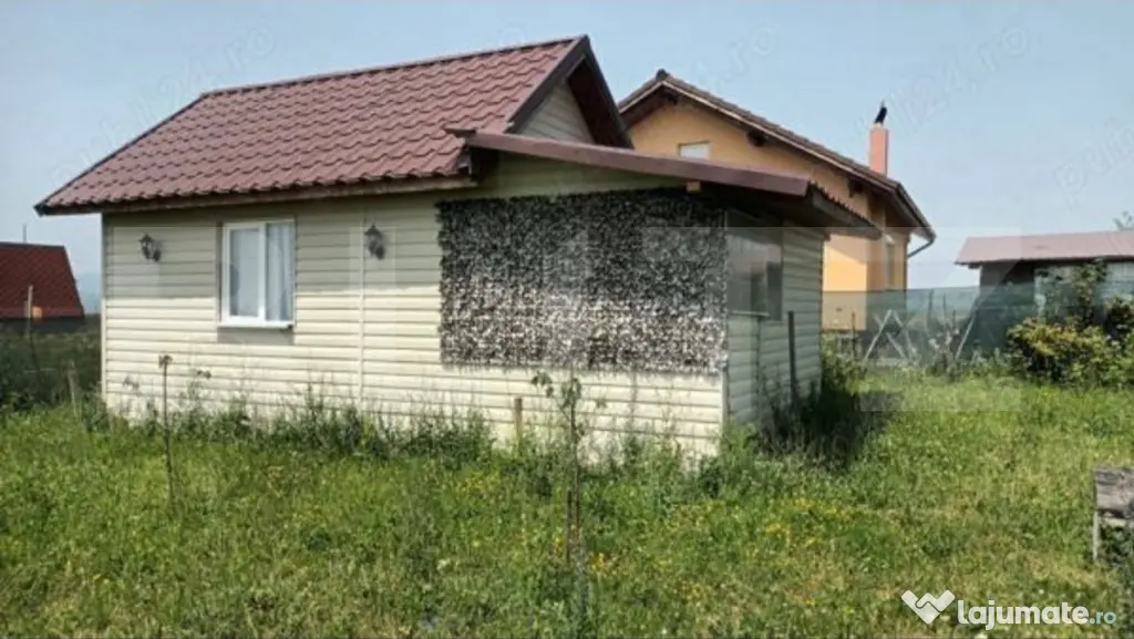 Teren intravilan de 425 mp, cu o cabană construită cu acte