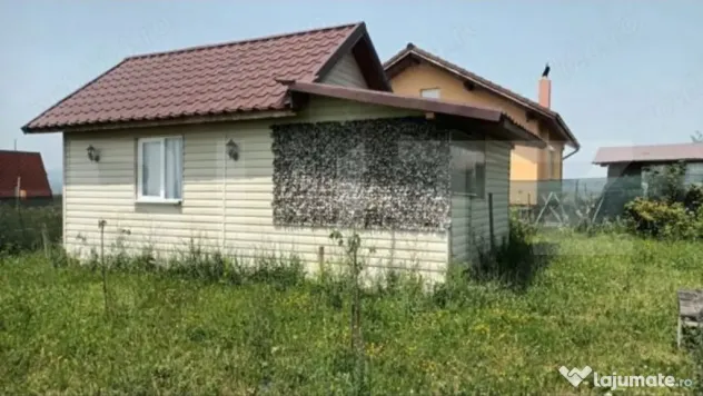 Teren intravilan de 425 mp, cu o cabană construită cu acte