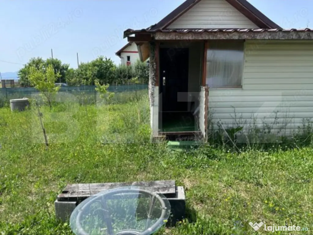 Teren intravilan de 425 mp, cu o cabană construită cu acte