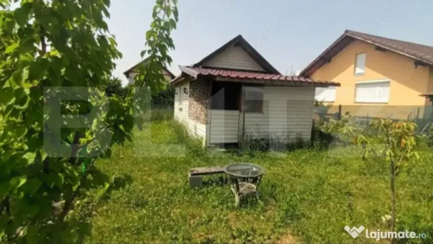 Teren intravilan de 425 mp, cu o cabană construită cu acte