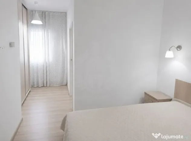 Apartament 2 camere, 2 bai, parcare subterana, zona 9 Mai,