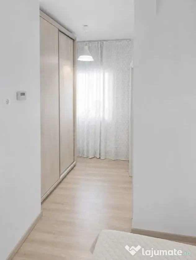 Apartament 2 camere, 2 bai, parcare subterana, zona 9 Mai,