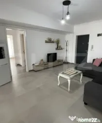 Apartament bloc nou, 72 mp, 2 dormitoare si living, parter,