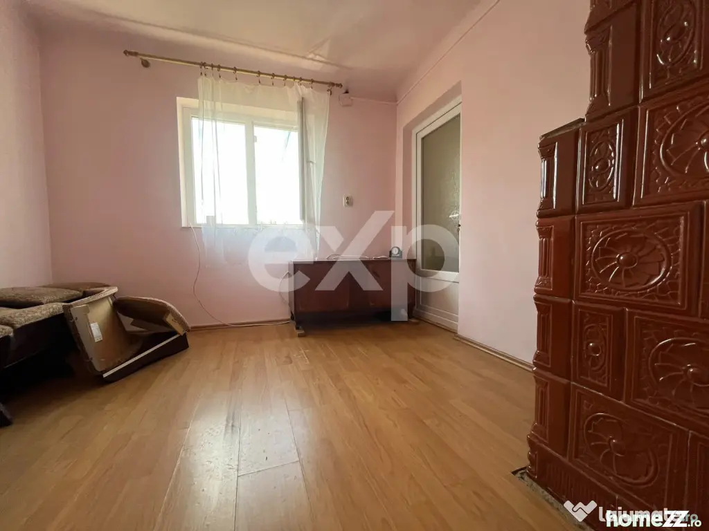 Casă cu 3 camere și teren 1.140 mp toate utilitățile, an - Pucioasa (Dambovita)