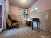 Casă cu 3 camere și teren 1.140 mp toate utilitățile, an 