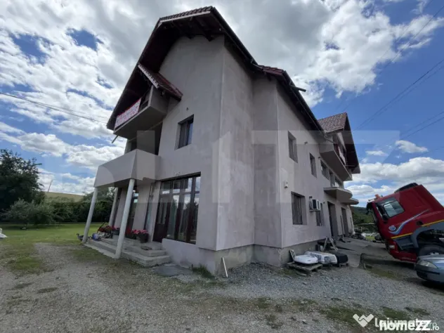 Casa de vanzare cu spatiu comercial, service auto si teren 3