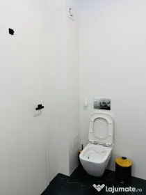 Apartament 2 camere, grădină 70 mp, 2 locuri de parcare central