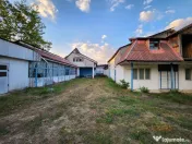 Teren intravilan 8.280 mp, utilități și construcții –