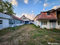Teren intravilan 8.280 mp, utilități și construcții –