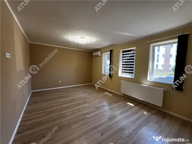 Spatiu comercial de 2 camere cu 2 bai 3 locuri de parcare zo