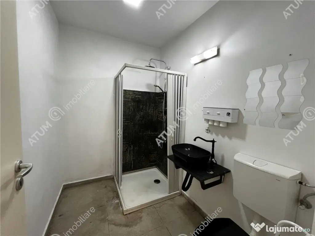 Spatiu comercial de 2 camere cu 2 bai 3 locuri de parcare zo