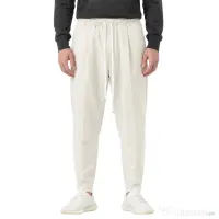 Pantaloni bărbați bej ușor slim cu șnur lung
