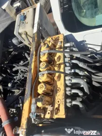 Distribuitor hidraulic excavator pe roti Case WX145